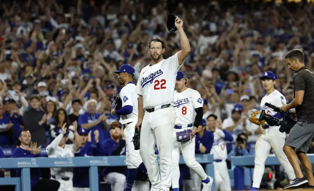 Los Angeles Dodgers pitcher Clayton Kershaw (22) tips his cap after striking out Chicago White Sox's Vinny Capra during the sixth inning for his 3,000th career strikeout Wednesday, July 2, 2025, in Los Angeles. (AP Photo/Kevork Djansezian)