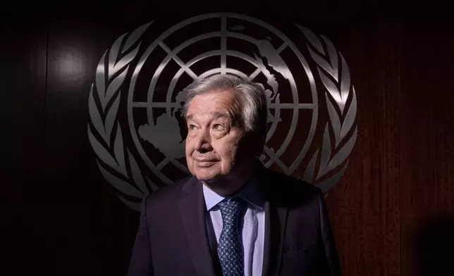 United Nations Secretary-General Antonio Guterres poses for a photograph at the United Nations headquarters on Tuesday, July 22, 2025, in New York. (AP Photo/Adam Gray)