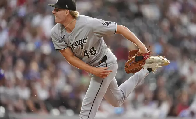 Chicago White Sox starting pitcher Jonathan Cannon works against the Colorado Rockies in the second inning of a baseball game Saturday, July 5, 2025, in Denver. (AP Photo/David Zalubowski)