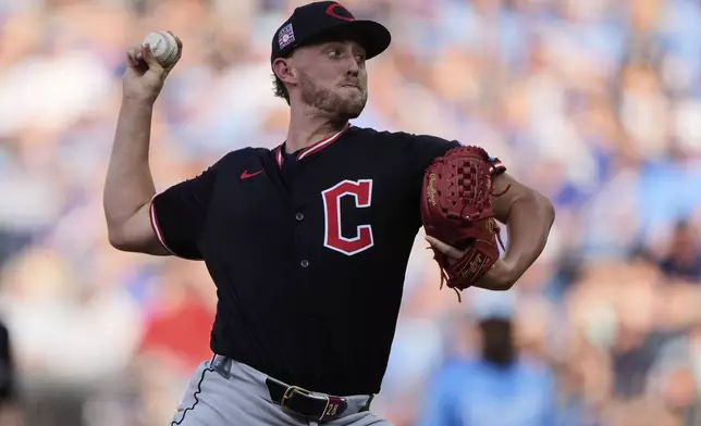 Cleveland Guardians starting pitcher Tanner Bibee throws during the first inning in the second baseball game of a doubleheader against the Kansas City Royals, Saturday, July 26, 2025, in Kansas City, Mo. (AP Photo/Charlie Riedel)