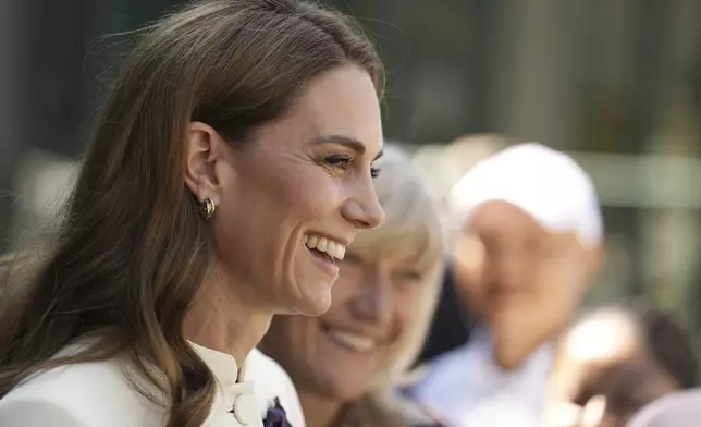 Britain's Kate, Princess of Wales arrives to attend the women's singles final between Poland's Iga Swiątek and Amanda Anisimova of the US at the Wimbledon Tennis Championships in London, Saturday, July 12, 2025. (Jordan Pettitt/Pool via AP)