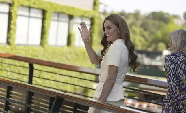 Britain's Kate, Princess of Wales arrives to attend the women's singles final between Poland's Iga Swiątek and Amanda Anisimova of the US at the Wimbledon Tennis Championships in London, Saturday, July 12, 2025. (Jordan Pettitt/Pool via AP)