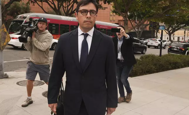 Dr. Salvador Plasencia leaves federal court on Wednesday, July 23, 2025 in Los Angeles, after pleading guilty to giving ketamine to Matthew Perry, leading up to the actor's 2023 overdose death. (AP Photo/Damian Dovarganes)