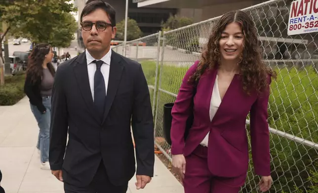 Dr. Salvador Plasencia, left, and his attorney Karen L. Goldstein, leave federal court on Wednesday, July 23, 2025 in Los Angeles, after pleading guilty to giving ketamine to Matthew Perry, leading up to the actor's 2023 overdose death. (AP Photo/Damian Dovarganes)