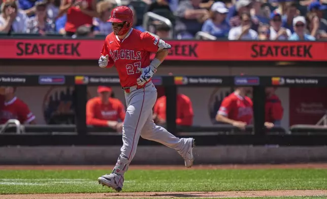 Los Angeles Angels' Mike Trout (27) runs the bases after hitting a home run during the third inning of a baseball game against the New York Mets Wednesday, July 23, 2025, in New York. (AP Photo/Frank Franklin II)
