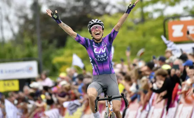 Spain's Mavi Garcia reacts as she crosses the finish line to win the second stage of the Women' s Tour de France cycling race that starts in Brest to finish in Quimper, Sunday, July 27, 2025 in Quimper, Brittany, western France. (AP Photo/Mathieu Pattier)