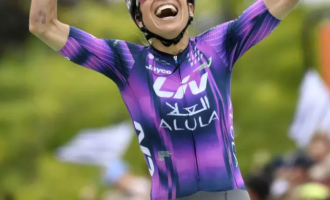 Spain's Mavi Garcia reacts as she crosses the finish line to win the second stage of the Women' s Tour de France cycling race that starts in Brest to finish in Quimper, Sunday, July 27, 2025 in Quimper, Brittany, western France. (AP Photo/Mathieu Pattier)