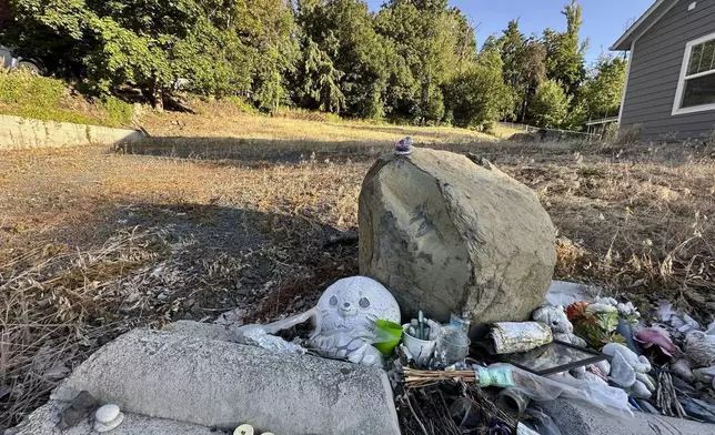 An empty lot stands on Monday, June 30, 2025, at the site where four University of Idaho students were killed in November 2022 inside a house in Moscow, Idaho. (AP Photo/Manuel Valdes)