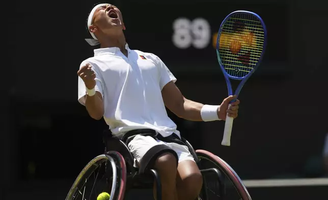 Tokito Oda of Japan reacts during the men's wheelchair singles final match against Alfie Hewett of Britain at the Wimbledon Tennis Championships in London, Sunday, July 13, 2025.(AP Photo/Joanna Chan)