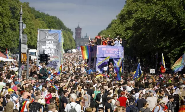 The 47th Berlin Pride, the Christopher Street Day (CSD) demonstration, arrives at the Grosser Stern in Berlin, Saturday, July 26, 2025. (Carsten Koall/dpa via AP)
