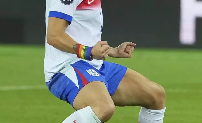 England's Lucy Bronze celebrates after scoring a penalty during a shootout of the Women's Euro 2025 quarterfinals soccer match between Sweden and England at Stadion Letzigrund in Zurich, Switzerland, Thursday, July 17, 2025. (AP Photo/Martin Meissner)