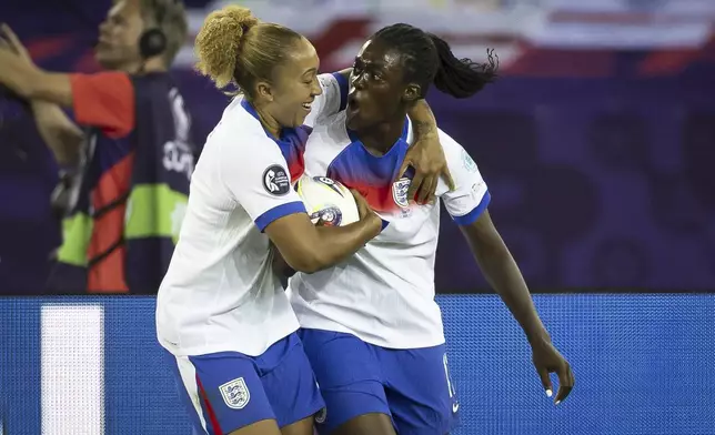 England's Michelle Agyemang, right, celebrates with Lauren James after scoring their second goal during the Women's Euro 2025 quarterfinals soccer match between Sweden and England at Stadion Letzigrund in Zurich, Switzerland, Thursday, July 17, 2025. (Michael Buholzer/Keystone via AP)