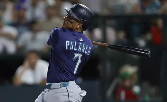 Seattle Mariners' Jorge Polanco hits a two run home run during the seventh inning of a baseball game against the Athletics Wednesday, July 30, 2025, in West Sacramento, Calif. (AP Photo/Sergio Estrada)