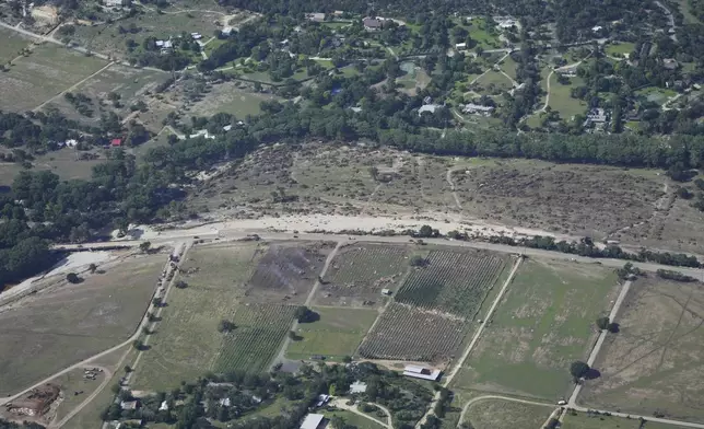 Damage is seen on Tuesday, July 8, 2025, near Hunt, Texas, after a flash flood swept through the area. (AP Photo/Ashley Landis)