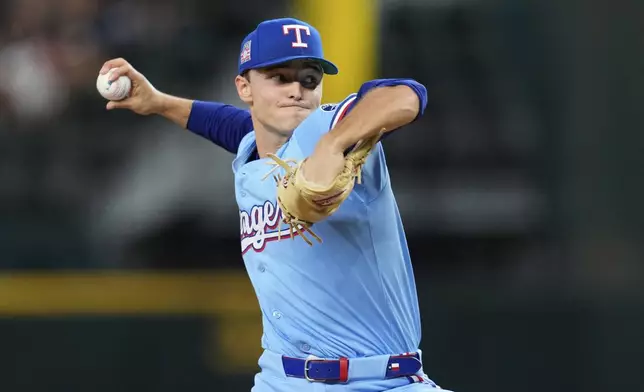 Texas Rangers starting pitcher Jack Leiter throws to the Atlanta Braves in the first inning of a baseball game Sunday, July 27, 2025, in Arlington, Texas. (AP Photo/Tony Gutierrez)