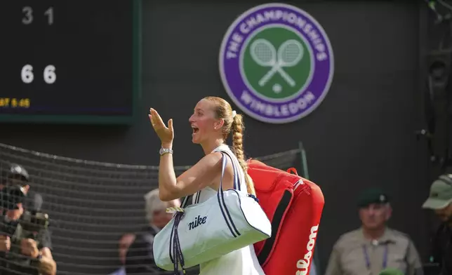 Petra Kvitova of Czech Republic waves to the crowd after her first round women's single match against Emma Navarro of the U.S. at the Wimbledon Tennis Championships in London, Tuesday, July 1, 2025.(AP Photo/Kirsty Wigglesworth)