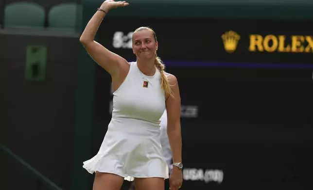 Petra Kvitova of Czech Republic waves to the crowd after her first round women's single match against Emma Navarro of the U.S. at the Wimbledon Tennis Championships in London, Tuesday, July 1, 2025.(AP Photo/Kirsty Wigglesworth)
