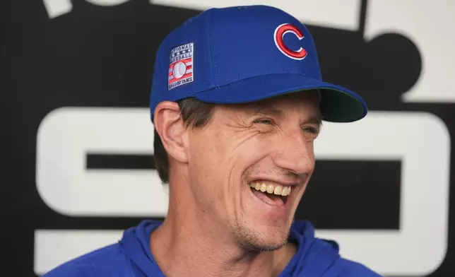 Chicago Cubs manager Craig Counsell sits in the dugout before a baseball game against the Chicago White Sox, Friday, July 25, 2025, in Chicago. (AP Photo/Erin Hooley)