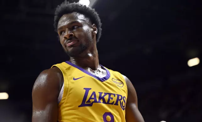 Los Angeles Lakers guard Bronny James (9) looks on during the first half of an NBA summer league basketball game against the Dallas Mavericks, Thursday, July 10, 2025, in Las Vegas. (AP Photo/David Becker)