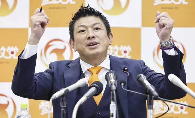 Sohei Kamiya, leader of Sanseito party speaks to the media following the upper house election in Tokyo, Sunday, July 20, 2025. (Kyodo News via AP)