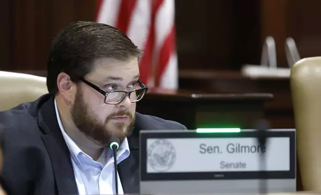 Sen. Ben Gilmore, R-Crossett, asks a question about the escape of inmate Grant Hardin during a meeting of the Charitable, Penal, and Correctional Institutions Subcommittee of the Arkansas Legislative Council on Thursday, July 10, 2025, in Little Rock, Ark. (Thomas Metthe/Arkansas Democrat-Gazette via AP)