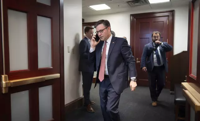 Speaker of the House Mike Johnson, R-La., arrives for an early morning strategy session with the Republican Conference, at the Capitol in Washington, Tuesday, July 22, 2025. (AP Photo/J. Scott Applewhite)