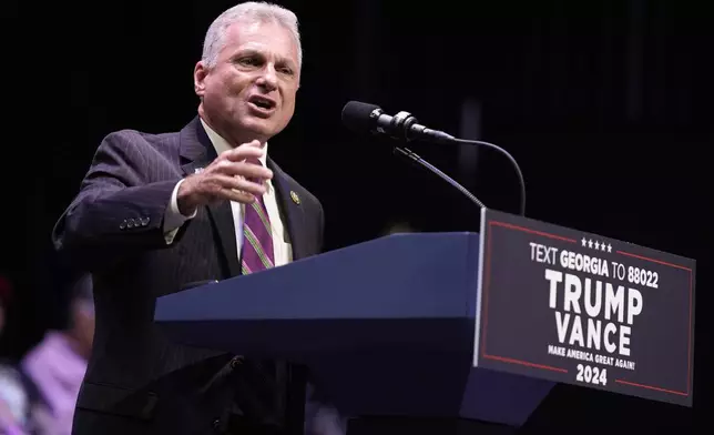 FILE - Rep. Buddy Carter, R-Ga., speaks at an event, Sept. 24, 2024, in Savannah, Ga. (AP Photo/Evan Vucci, File)