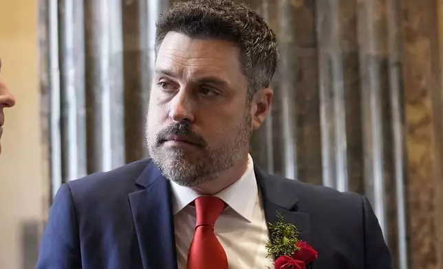FILE - Republican state senator Blake Miguez converses before the swearing-in of the Louisiana state legislature in Baton Rouge, La., Monday, Jan. 8, 2024. (AP Photo/Gerald Herbert, Pool, File)