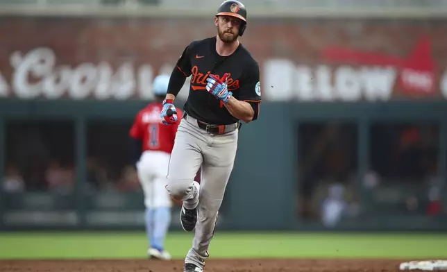Baltimore Orioles' Jordan Westburg rounds second base after hitting a solo home run in the third inning of a baseball game against the Atlanta Braves, Friday, July 4, 2025, in Atlanta. (AP Photo/Colin Hubbard)