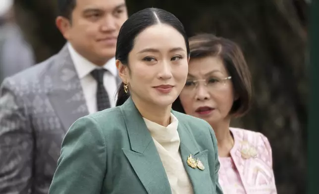 Thailand's Prime Minister Paetongtarn Shinawatra arrives at Government House for a cabinet meeting in Bangkok, Thailand, Tuesday, July 1, 2025. (AP Photo/Sakchai Lalit)