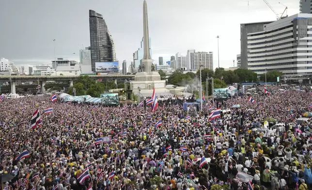 Protesters gather at Victory Monument demanding Thailand's Prime Minister Paetongtarn Shinawatra resign in Bangkok, Thailand, Saturday, June 28, 2025. (AP Photo/Sakchai Lalit)