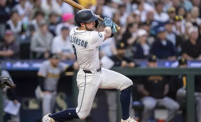 Seattle Mariners' Ben Williamson hits a RBI-double during the sixth inning of a baseball game against the Pittsburgh Pirates, Saturday, July 5, 2025, in Seattle. (AP Photo/Stephen Brashear)