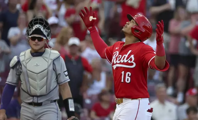 Cincinnati Reds' Noelvi Marte (16) celebrates his home run during the seventh inning of a baseball game against the Colorado Rockies, Saturday, July 12, 2025, in Cincinnati. (AP Photo/Joe Maiorana)
