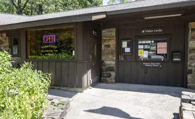 The visitors center at Devils Den State Park is open Monday, July 28, 2025, in West Fork, Ark. Police in Arkansas are searching for a suspect in the deaths of a couple who investigators said were attacked while on a wooded walking trail with their two young daughters. (AP Photo/Michael Woods)