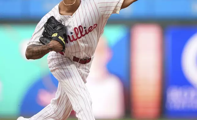 Philadelphia Phillies' Cristopher Sánchez pitches during the first inning of a baseball game against the Boston Red Sox Tuesday, July 22, 2025, in Philadelphia. (AP Photo/Matt Slocum)