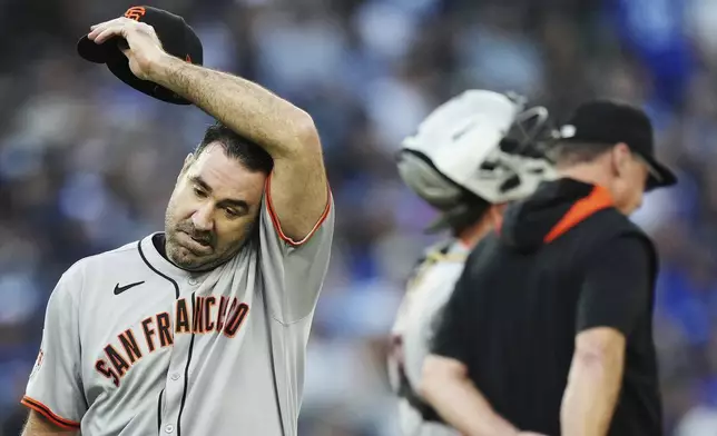 San Francisco Giants pitcher Justin Verlander (35) reacts after being taken out of the game against the Toronto Blue Jays during third inning MLB baseball action in Toronto on Friday, July 18, 2025. (Nathan Denette/The Canadian Press via AP)