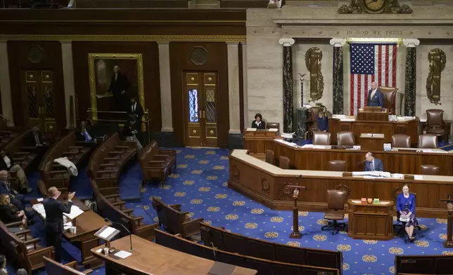 House Minority Leader Hakeem Jeffries, D-N.Y., left, speaks in the House chamber prior to the final vote for President Donald Trump's signature bill of tax breaks and spending cuts, at the Capitol, Thursday, July 3, 2025, in Washington. (AP Photo/Rod Lamkey, Jr.)
