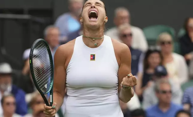 Aryna Sabalenka of Belarus reacts during her second round women's singles match against Marie Bouzkova of the Czech Republic at the Wimbledon Tennis Championships in London, Wednesday, July 2, 2025.(AP Photo/Kirsty Wigglesworth)