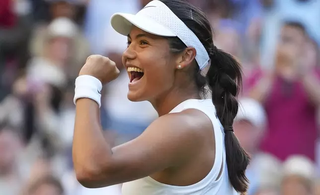Emma Raducanu of Britain celebrates winning the second round women's singles match against Marketa Vondrousova of the Czech Republic at the Wimbledon Tennis Championships in London, Wednesday, July 2, 2025.(AP Photo/Kirsty Wigglesworth)