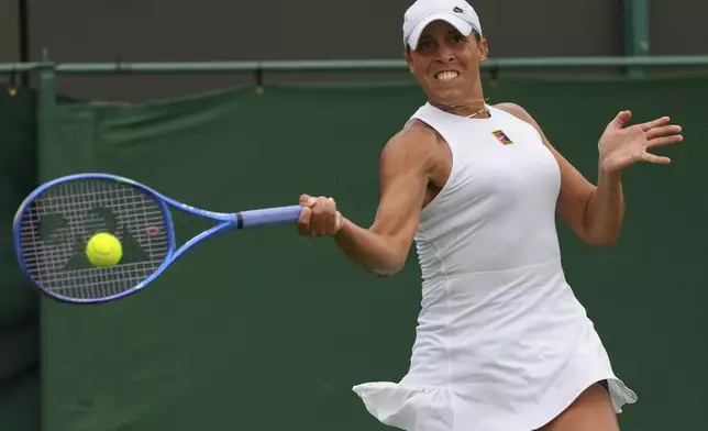 Madison Keys of the U.S. returns to Olga Danilovic of Serbia during their second round singles match at the Wimbledon Tennis Championships in London, Wednesday, July 2, 2025. (AP Photo/Joanna Chan)