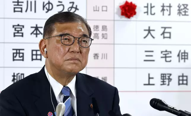 Shigeru Ishiba, Japan's Prime Minister and president of the ruling Liberal Democratic Party (LDP) meets the media at the LDP headquarters in Tokyo, Sunday, July 20, 2025. (Franck Robichon, Pool Photo via AP)