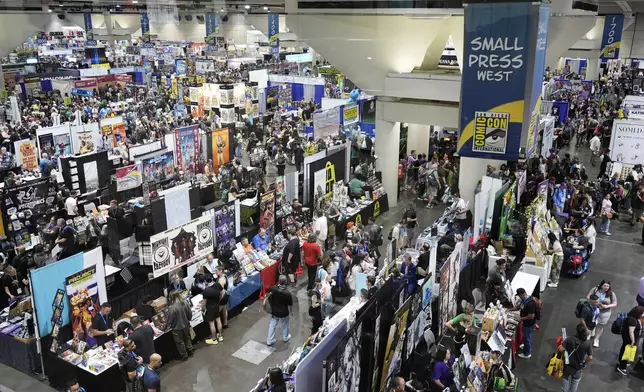 The Comic-Con convention floor is pictured during the 2025 Comic-Con International Preview Night on Wednesday, July 23, 2025, in San Diego. (AP Photo/Chris Pizzello)