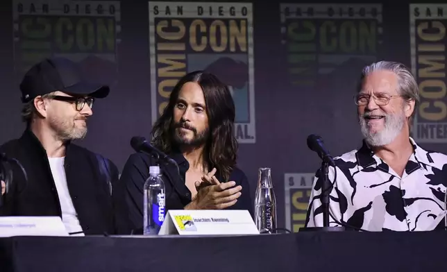 Joachim Ronning, from left, Jared Leto, and Jeff Bridges attend a panel for "Tron: Ares" during Comic-Con International on Friday, July 25, 2025, in San Diego. (Photo by Richard Shotwell/Invision/AP)