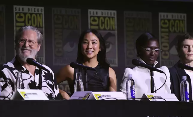 Jeff Bridges, from left, Greta Lee, Jodie Turner-Smith, and Evan Peters attends a panel for "Tron: Ares" during Comic-Con International on Friday, July 25, 2025, in San Diego. (Photo by Richard Shotwell/Invision/AP)