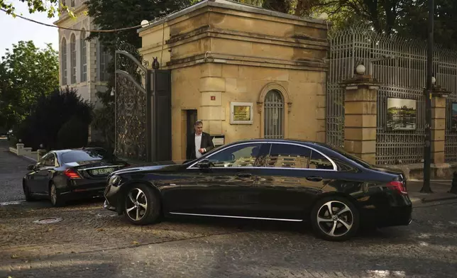 Cars, which are believed to carry European diplomats, enter the Iranian consulate ahead of a meeting with Iranian counterparts for talks over Tehran's nuclear program, in Istanbul, Turkey, Friday, July 25, 2025. (AP Photo/Francisco Seco)