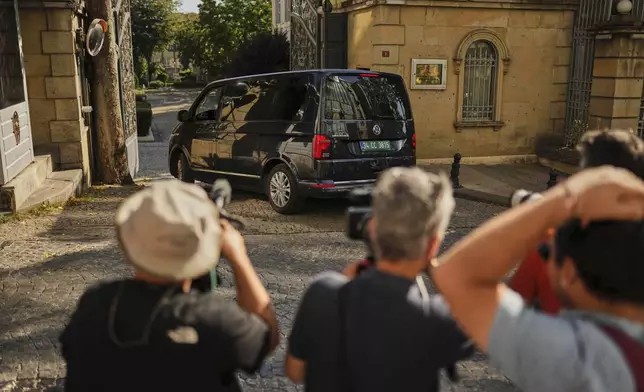 A van, which is believed to carry European diplomats, enters the Iranian consulate ahead of a meeting with Iranian counterparts for talks over Tehran's nuclear program, in Istanbul, Turkey, Friday, July 25, 2025. (AP Photo/Francisco Seco)