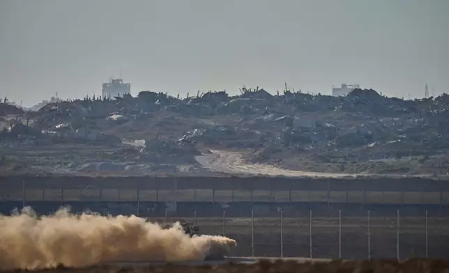 An Israeli army APC moves along the border of the gaza strip in southern Israel, Sunday, July 6, 2025. (Photo/Ohad Zwigenberg)