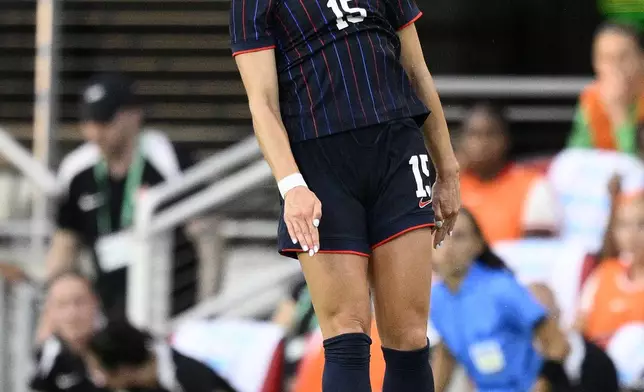 United States midfielder Claire Hutton (15) heads the ball during the first half of an international friendly soccer match against Canada, Wednesday, July 2, 2025, in Washington. (AP Photo/Nick Wass)