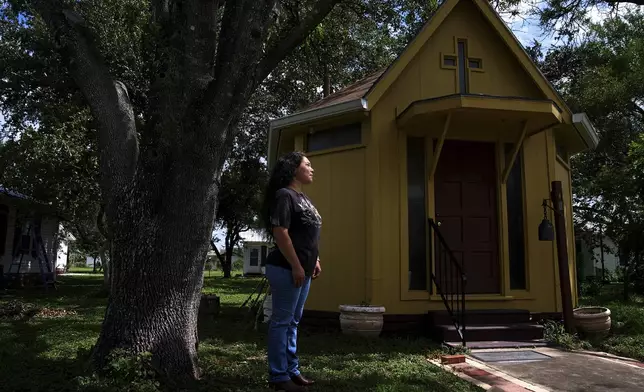 Juanita poses for a portrait outside the chapel of Holy Family Services, a birth center and women's clinic in the Rio Grande Valley, Wednesday, June 18, 2025, in Weslaco, Texas. (AP Photo/Jacquelyn Martin)