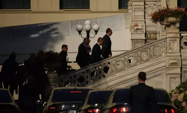 Turkish National Intelligence Director Ibrahim Kalin, right, arrives to Ciragan palace ahead of expected talks between Russian and Ukrainian delegations, in Istanbul, Turkey, Wednesday, July 23, 2025. (AP Photo/Emrah Gurel)